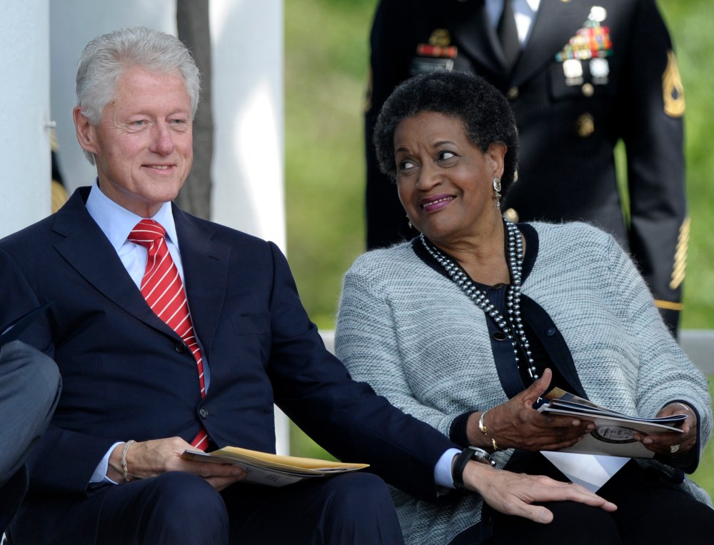 Former President Bill Clinton sits next to Myrlie Evers-Williams, the widow of slain civil rights activist Medgar Evers, during the 50th anniversary remembrance ceremony of his death, Wednesday, June 5, 2013,  at Arlington National Cemetery in...