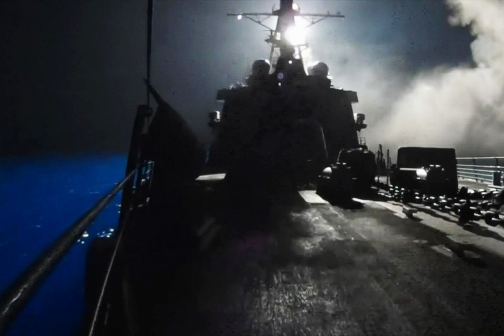 In this image made from video released by the U.S. Navy on Tuesday, Sept. 23, 2014, missiles bound for Syrian Islamic State group targets are launched off of a U.S. Navy ship.
