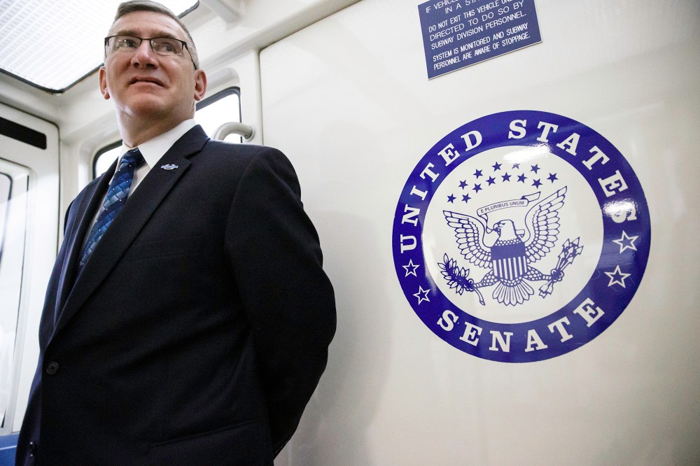 After finishing with a series of votes, Sen. John Walsh, D-Mont., leaves the Capitol to monitor the primary race back home in Montana, Tuesday, June 3, 2014, in Washington.