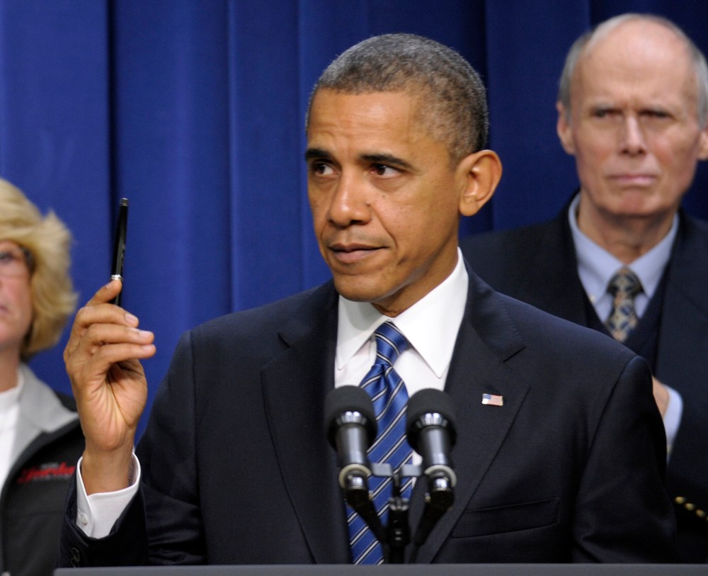President Barack Obama gestures as he speaks in the Eisenhower Executive Office Building, on the White House campus in Washington, Wednesday  (AP Photo/Susan Walsh)