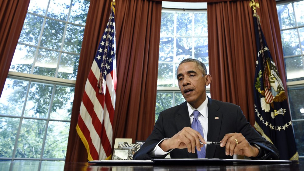 President Barack Obama speaks before vetoing the National Defense Authorization Act (NDAA), Thursday, Oct. 22, 2015, in the Oval Office of the White House in Washington. (Photo by Susan Walsh/AP)