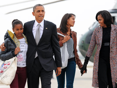 The Obama family boarding Air Force One in Chicago, traveling back to Washington, D.C. the day after the election. (Jewel Samad/Getty Images)