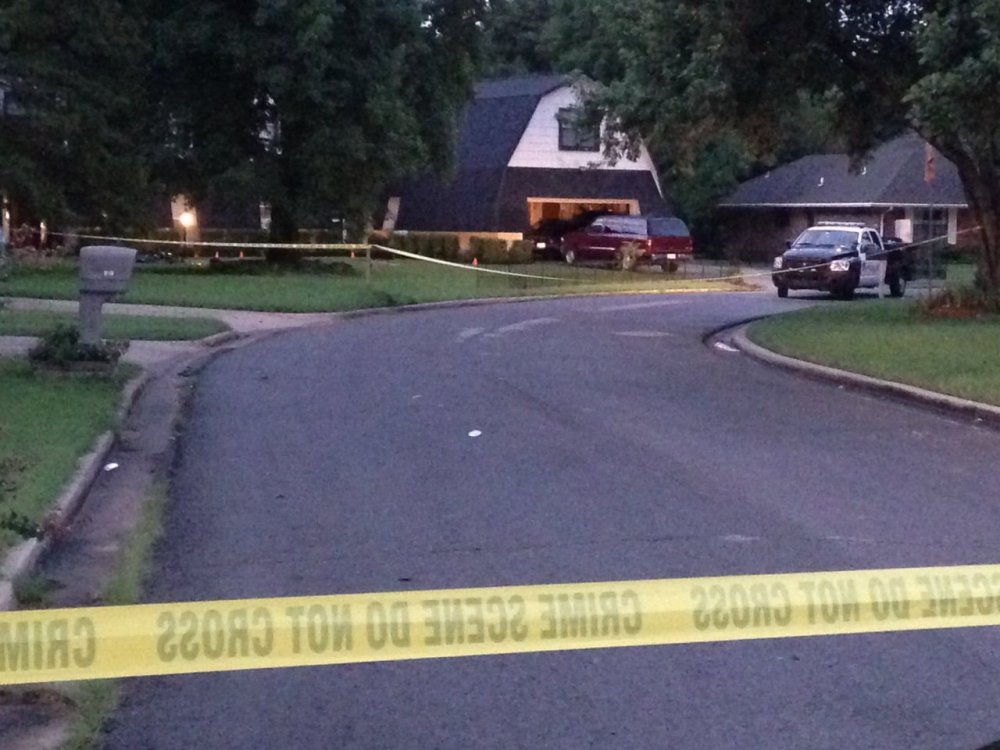Crime scene tape marks off the area as police investigate scene, July 23, 2015, in Broken Arrow, Okla., where authorities say five people were found dead late Wednesday night. (Photo by Justin Juozapavicius/AP)