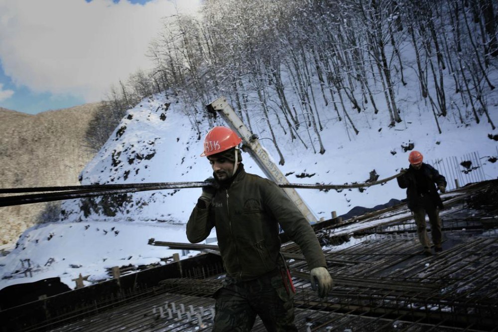 Foreign workers on a construction site for a ski resort in Krasnaya Polyana, near Sochi, Russia.