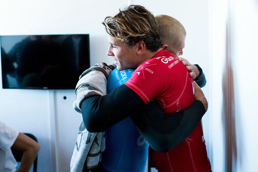 Mick Fanning and Julian Wilson (Photo by Kristen Scholtz/WSL/AFP/Getty)