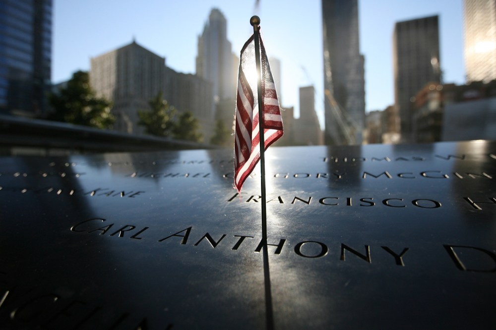 A small US flag stands at September 11 memorial during observances on the eleventh anniversary of the attacks on the World Trade Center, on September 11, 2012 in New York.
