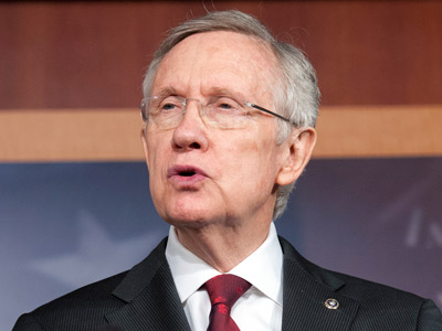 Senate Majority Leader Harry Reid, D-Nev., speaks with reporters on Capitol Hill in Washington, D.C. March 14, 2013. (Photo by Cliff Owen/AP)