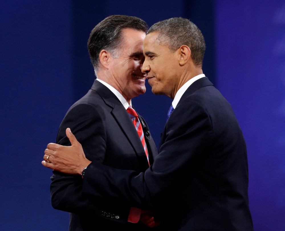 Republican presidential candidate, former Massachusetts Gov. Mitt Romney and President Barack Obama shake hands at the end of the last debate at Lynn University, Monday, Oct. 22, 2012, in Boca Raton, Fla. (AP Photo/Pablo Martinez Monsivais)