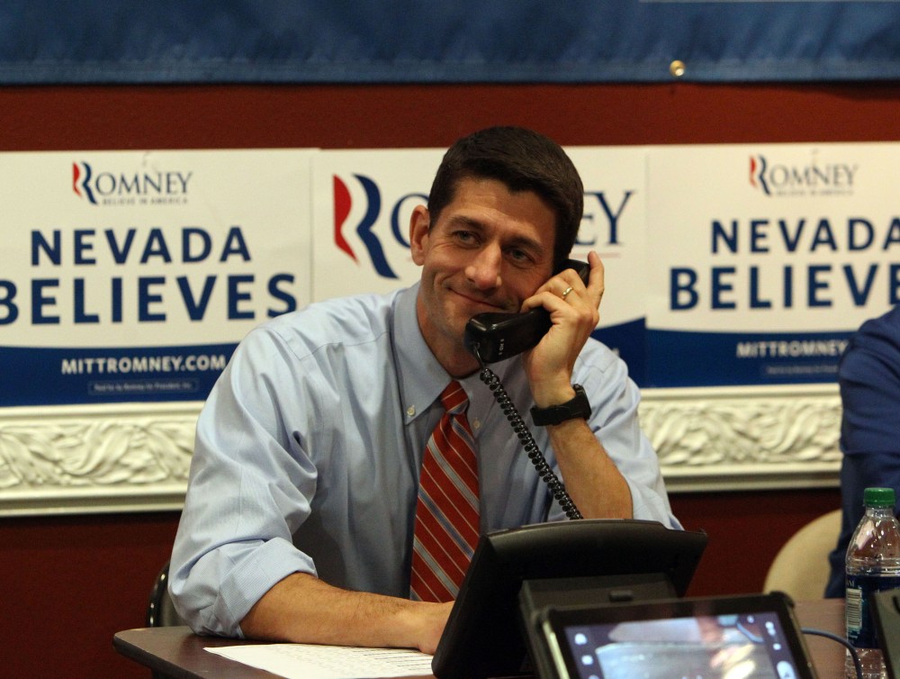 Republican vice presidential candidate, Rep. Paul Ryan of Wisconsin mans the phones at the Team Nevada headquarters in Las Vegas, Thursday, Nov. 1, 2012. (AP Photo/Las Vegas Review-Journal, Jerry Henkel, pool)