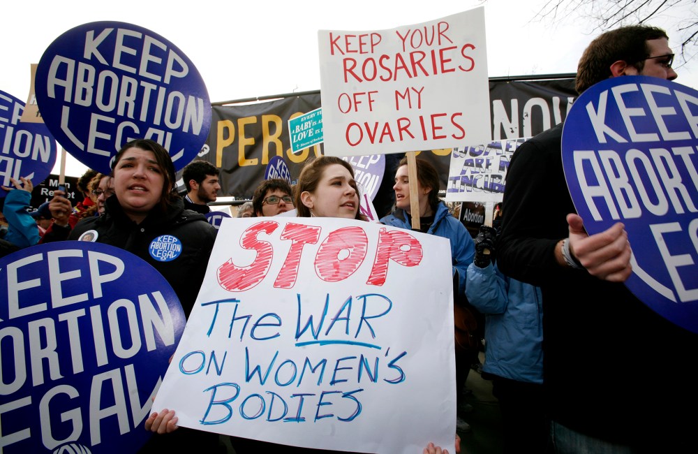 Pro-choice activists demonstrate during March for Life Fund's 37th annual march in Washington