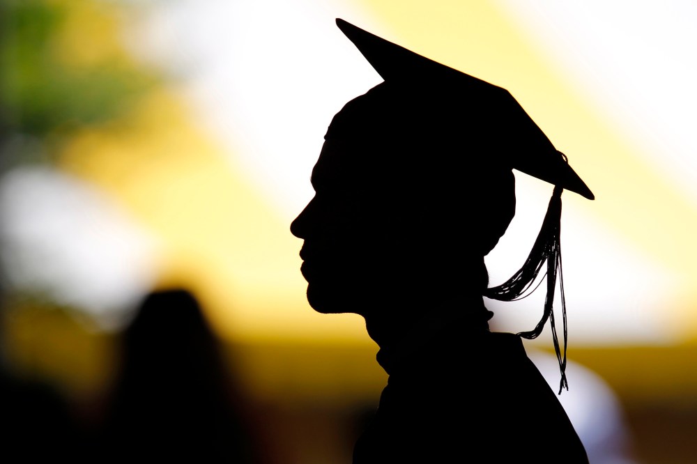 Students take their seats for the diploma ceremony during commencement exercises. (Photo by Brian Snyder/Reuters)