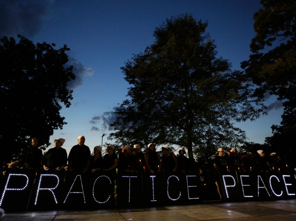 The community gathers for a vigil in Oak Creek - Traci Lee - 09/23/2013