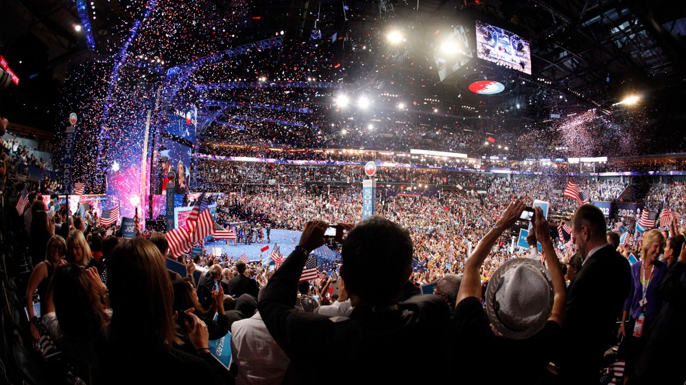 Delegates cheer as President Barack Obama is joined on stage by his family at the conclusion of the final session of the Democratic National Convention in Charlotte, North Carolina, Sept. 6, 2012.