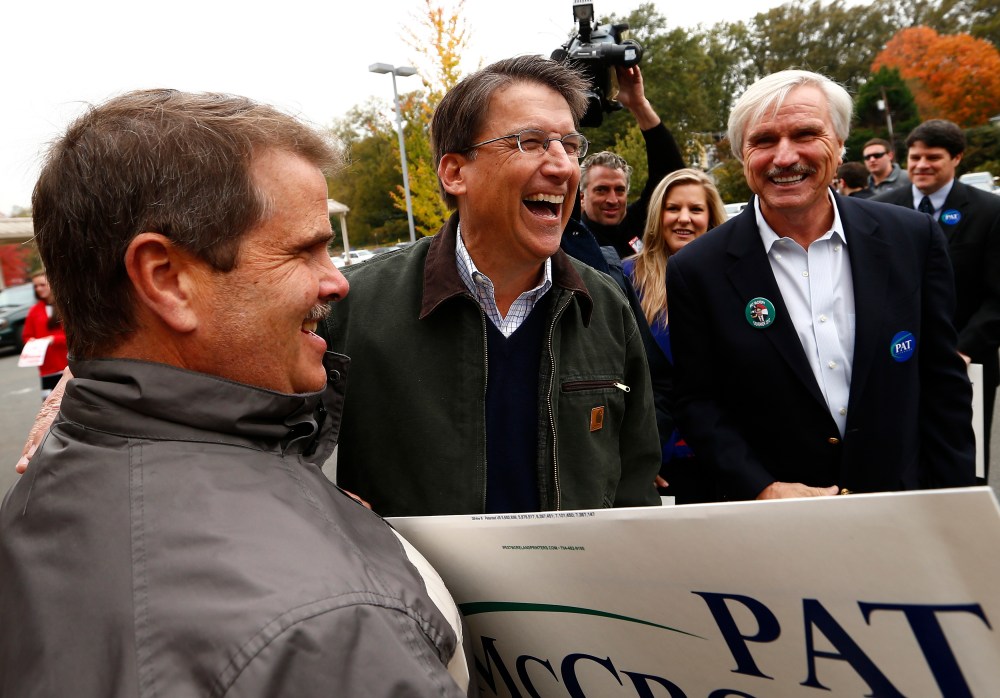 North Carolina Governor Pat McCrory meets supporters outside Myers Park Traditional Elementary school during the U.S. presidential election in Charlotte, NC on Nov. 6, 2012.
