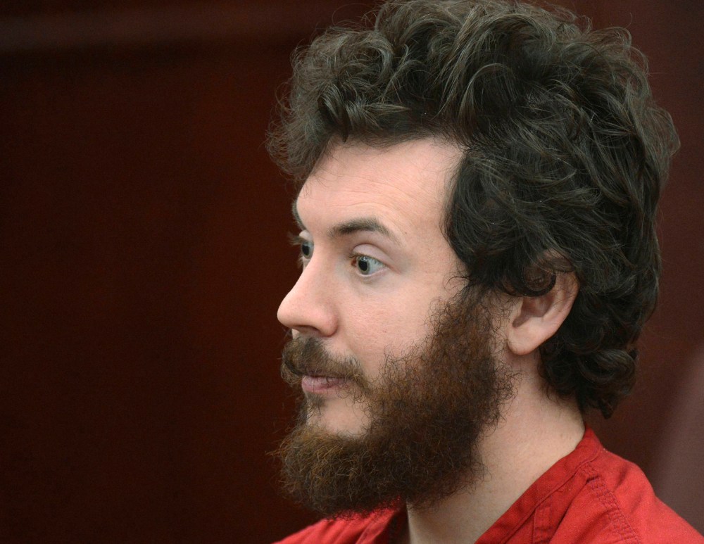Accused Aurora theater gunman James Holmes listens during his arraignment in Centennial, Colo., March 12, 2013. (Photo by R.J. Sangosti/Reuters)