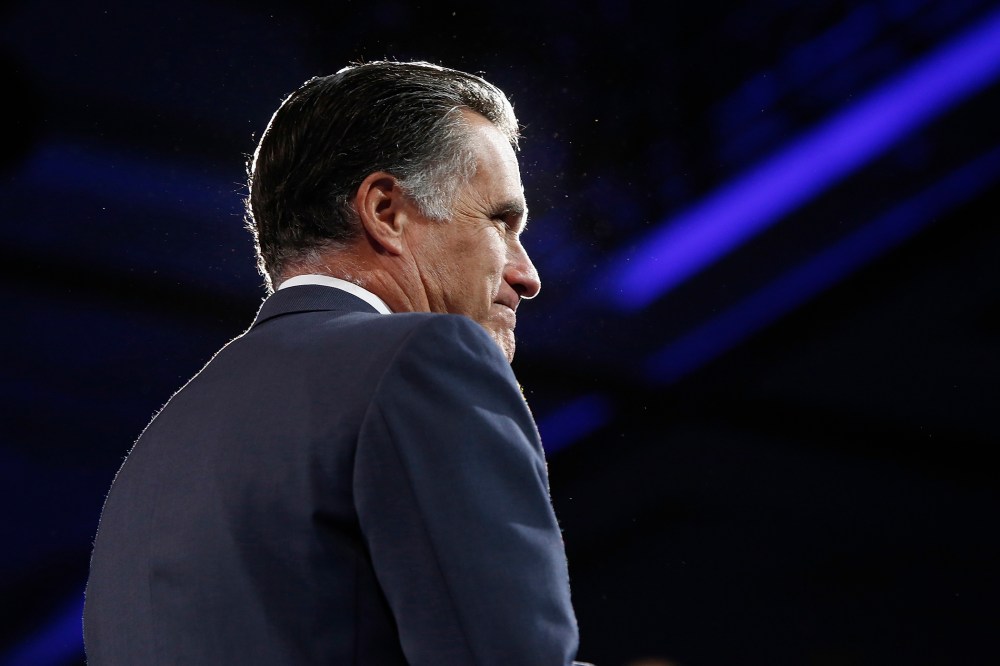 Former U.S. presidential candidate Mitt Romney takes the stage at CPAC in National Harbor, Maryland, March 15, 2013.