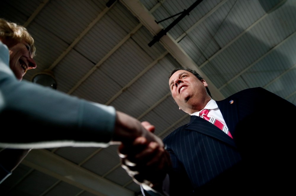 New Jersey Governor Chris Christie speaks to residents of Belmar, New Jersey during a town hall meeting on March 25, 2014.