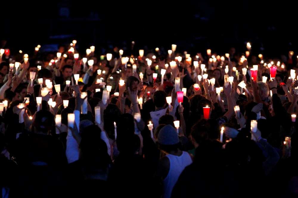 Supporters attend a candlelight vigil after a shooting at Reynolds High School in Troutdale, Oregon