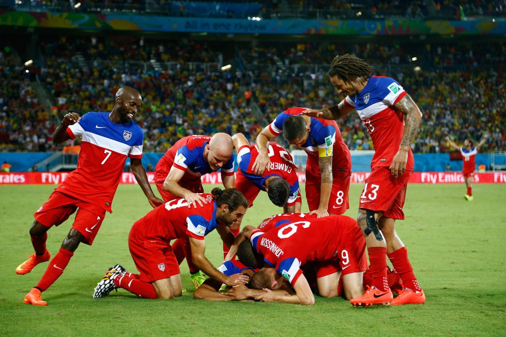 Team U.S.A celebrate during the 2014 World Cup Group G soccer match between Ghana and the U.S. at the Dunas arena
