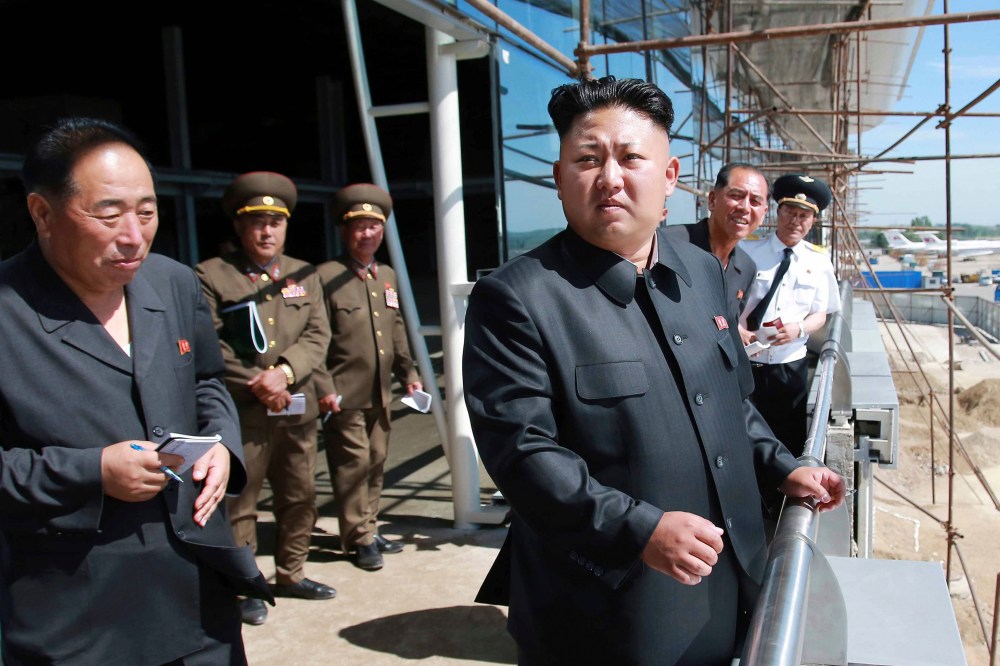 North Korean leader Kim Jong Un pays a visit to the construction site of a terminal at Pyongyang International Airport, July 11, 2014. (Photo by KCNA KCNA/Reuters)