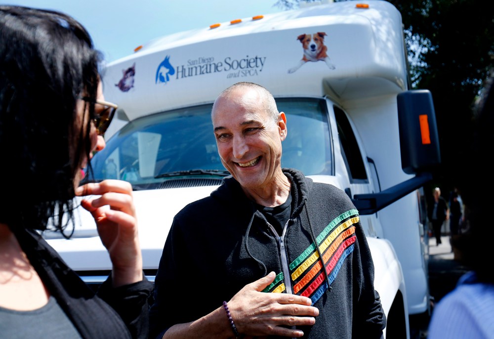 Hollywood mogul and co-creator of The Simpsons, Sam Simon, smiles while visiting a chinchilla farm after he financed the purchase of the facility by PETA in order to rescue over 400 chinchillas in Vista, Calif. Aug. 19, 2014. (Photo by Mike Blake/Reuters)