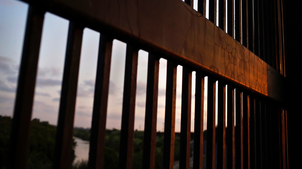 The border fence stands at the United States-Mexico border along the Rio Grande river in Brownsville, Texas. (Photo by Shannon Stapleton/Reuters)