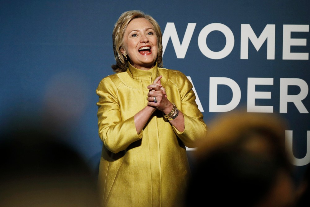 Former U.S. Secretary of State Hillary Clinton arrives to address the Democratic National Committee's Women's Leadership Forum in Washington, Sept. 19, 2014.