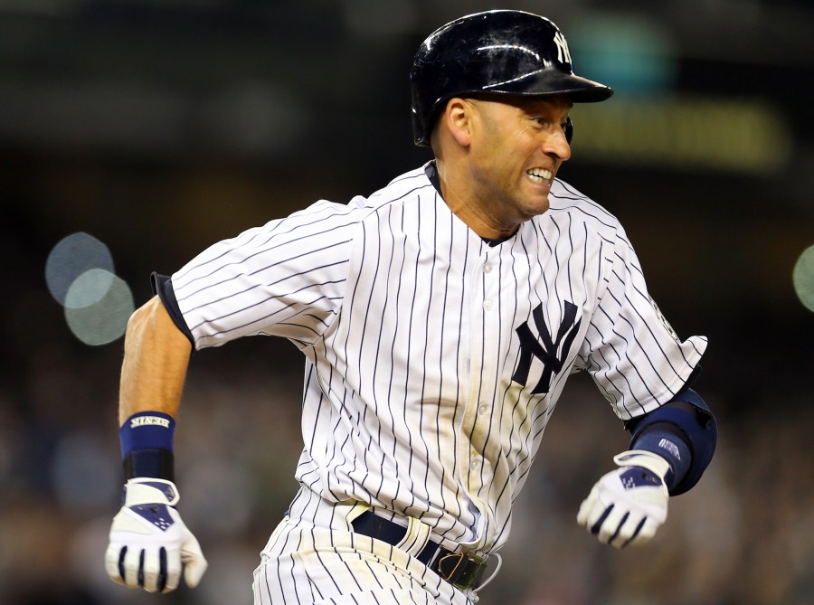 Derek Jeter runs up the first base line after hitting a single against the Baltimore Orioles during the seventh inning at Yankee Stadium, Sep. 23, 2014. (Photo by Adam Hunger/Reuters)
