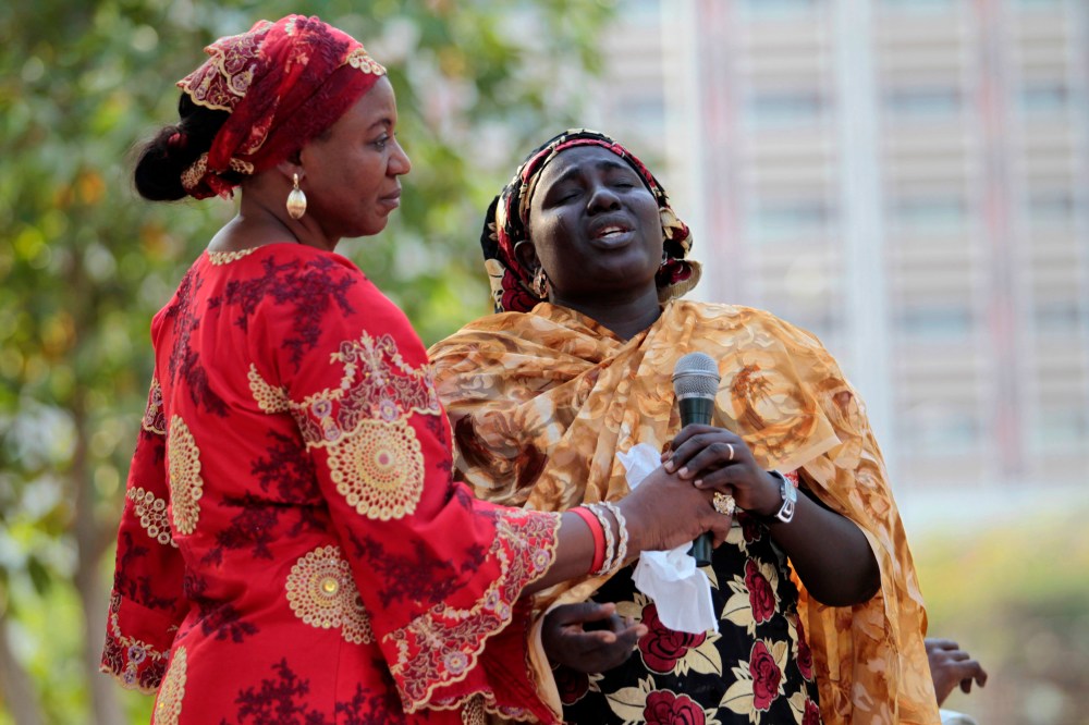 Rebecca Samuel (R), mother of one of the abducted Chibok schoolgirls, reacts while speaking at a meeting to review efforts to recover the abducted Chibok girls in Abuja, Nigeria, on Jan. 1, 2015. (REUTERS/Afolabi Sotunde)