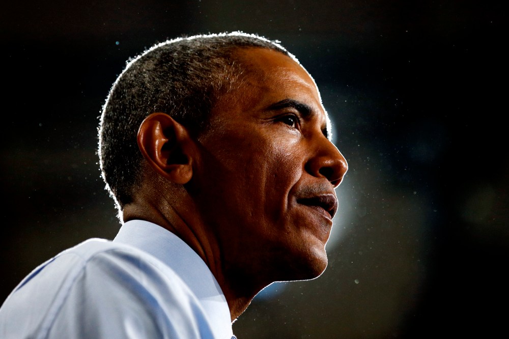 President Barack Obama pauses while speaking during a visit to the University of Kansas in Lawrence, Kansas, on Jan. 22, 2015. (Photo by Kevin Lamarque/Reuters)