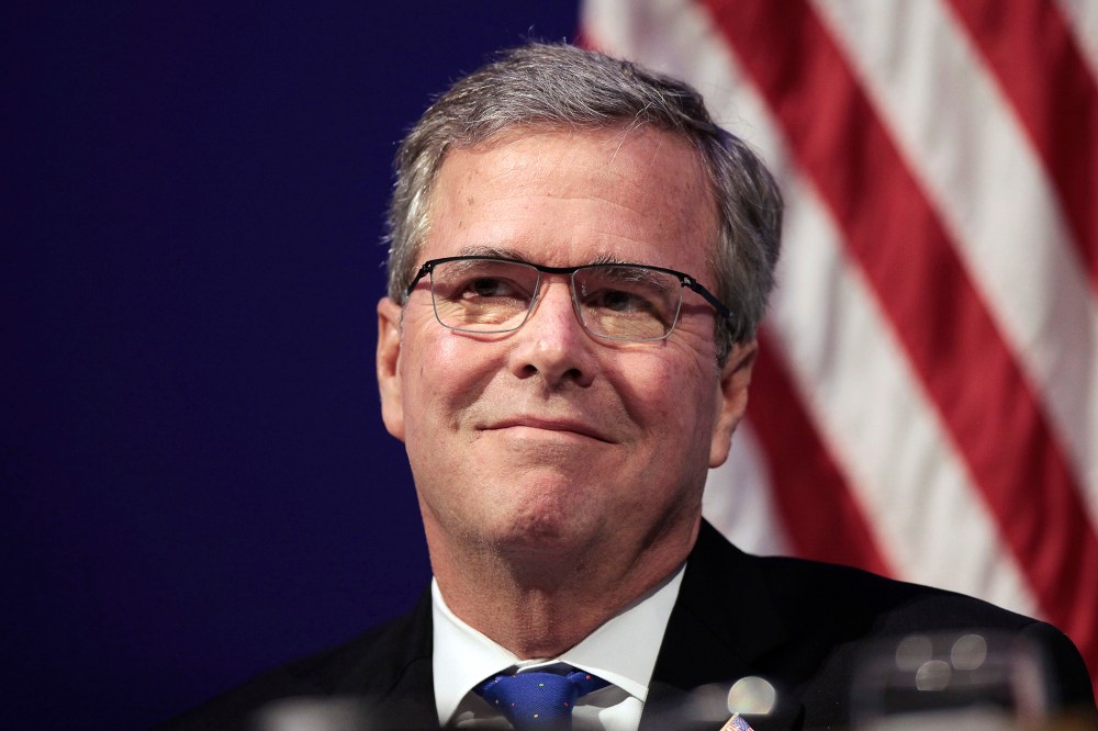 Former Florida Governor Jeb Bush smiles as he is introduced to speak at an event in Detroit, Mich., Feb., 4, 2015. (Photo by Rebecca Cook/Reuters)