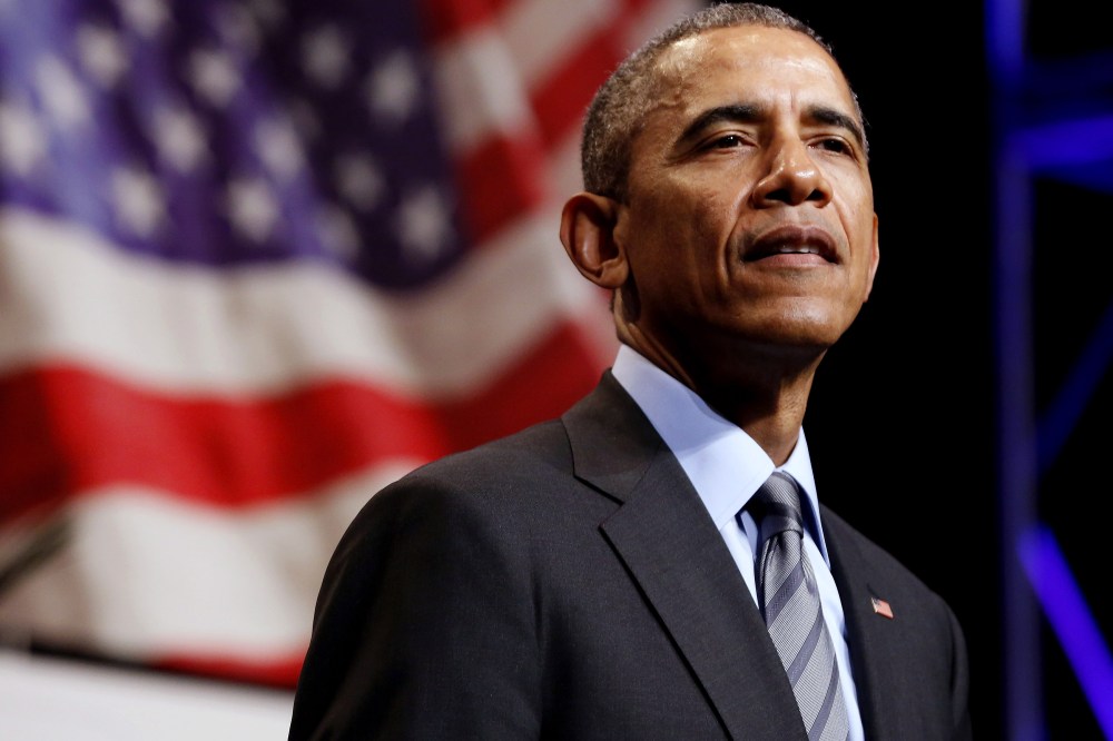 US President Barack Obama pauses as he makes remarks at the National League of Cities annual Congressional City Conference in Washington, March 9, 2015. (Photo by Jonathan Ernst/Reuters)