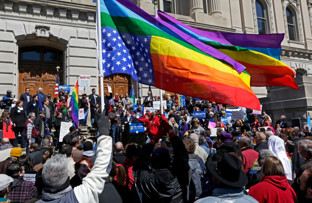 Demonstrators gather at Monument Circle to protest a controversial religious freedom bill recently signed by Governor Mike Pence, during a rally in Indianapolis March 28, 2015. (Photo by Nate Chute/Reuters)