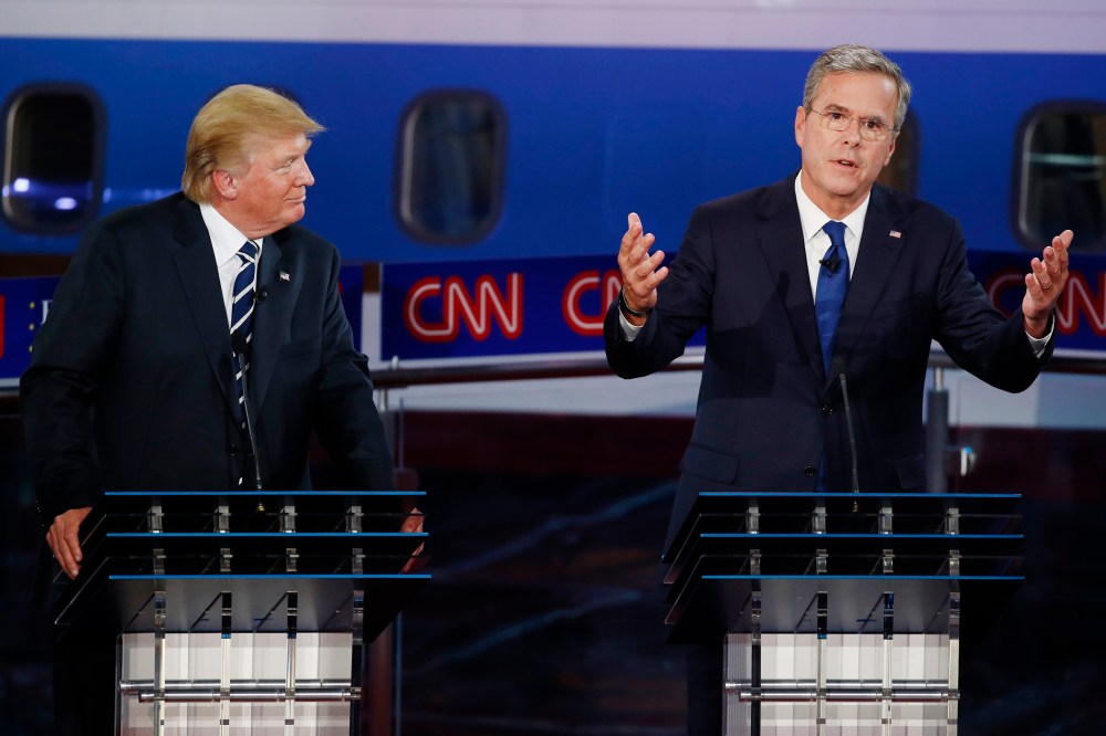 Donald Trump looks on as former Florida Governor Jeb Bush speaks during the second official Republican presidential candidates debate at the Ronald Reagan Presidential Library in Simi Valley, Calif, Sept. 16, 2015. (Photo by Lucy Nicholson/Reuters)