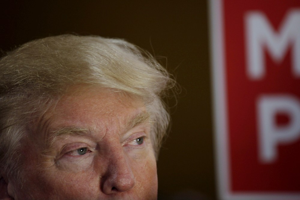 Republican Presidential candidates Donald Trump takes interviews in the spin room after the debate held by Fox Business Network for the top 2016 U.S. Republican candidates in Milwaukee, Wis., Nov. 10, 2015. (Photo by Darren Hauck/Reuters)