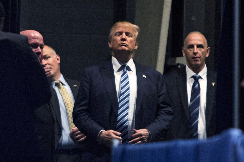 U.S. Republican presidential candidate Donald Trump waits to be introduced during a campaign event at Iowa Central Community College in Ft. Dodge, Ia., Nov. 12, 2015. (Photo by Scott Morgan/Reuters)