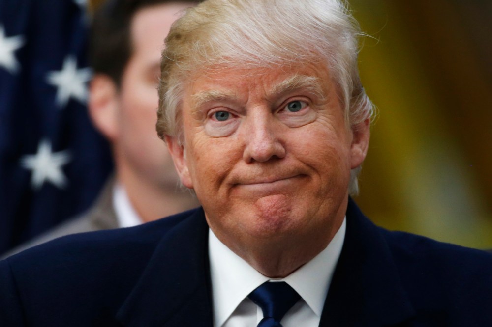 Republican presidential candidate Donald Trump reacts during a news conference at the construction site of the Trump International Hotel at the Old Post Office Building in Washington, March 21, 2016. (Photo by Jim Bourg/Reuters)