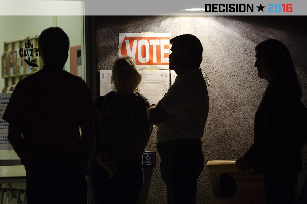 Early morning voters stand in line before sunrise to vote in Arizona's presidential primary election at a polling station in Cave Creek, Ariz., March 22, 2016. (Photo by Nancy Wiechec/Reuters)