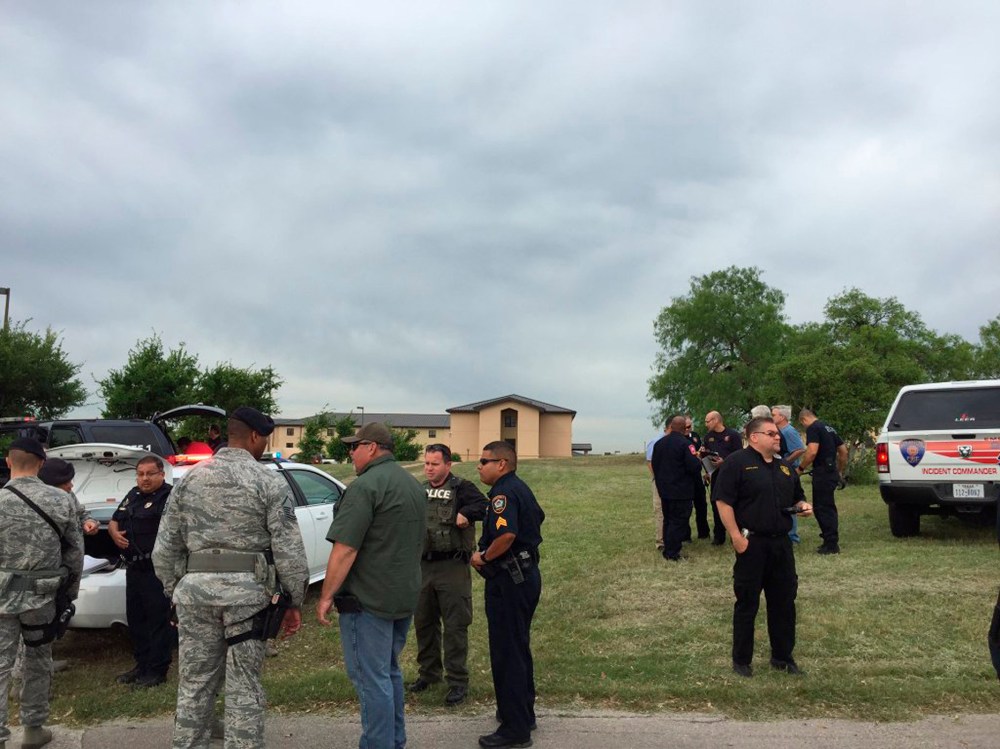 Bexar County Sheriff's deputies are seen inside Lackland Air Force Base in this image tweeted by @BexarCoSheriff in San Antonio, Texas April 8, 2016. (Photo by Bexar County Sheriff/Handout/Reuters)