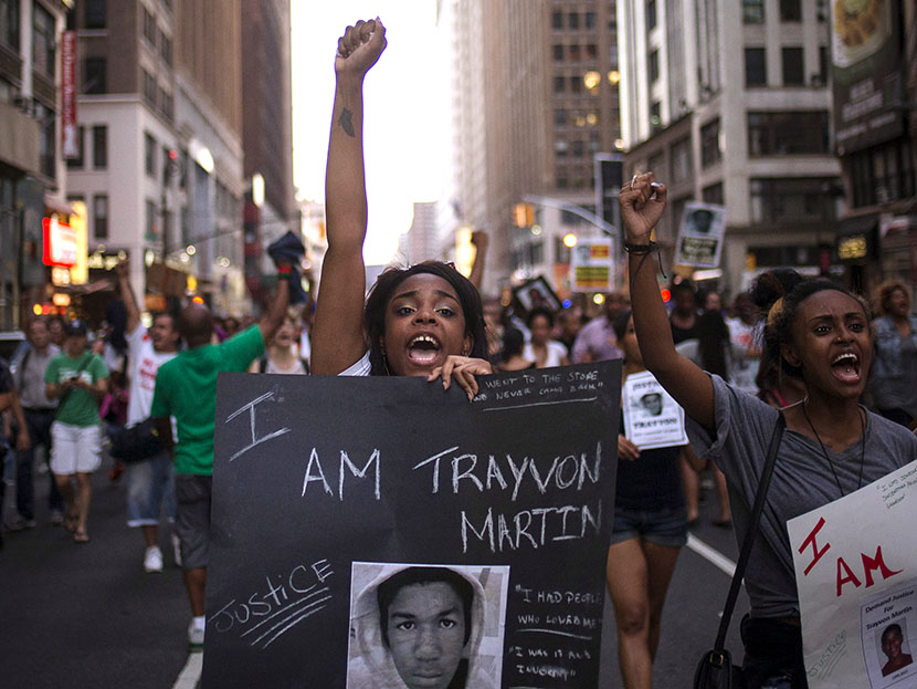 A woman yells slogans with demonstrators supporting Trayvon Martin while marching to Times Square from New York's Union Square on July 14, 2013. (Photo by Adrees Latif/Reuters)