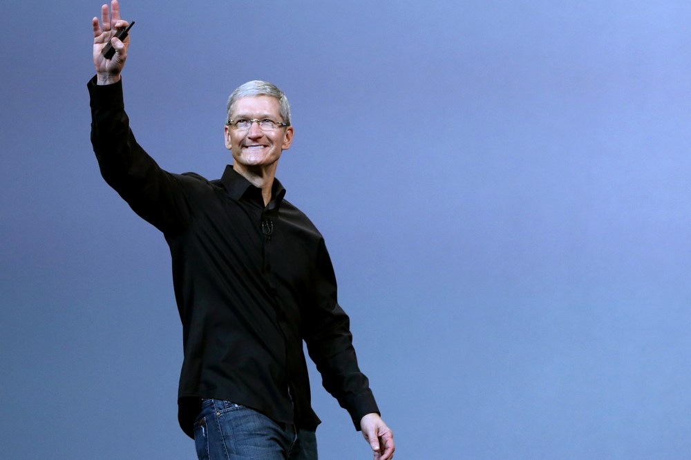 Apple Inc CEO Tim Cook steps out on stage during an Apple event in San Francisco, Calif. on Oct. 22, 2013.