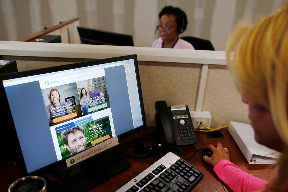 Janet Perez oversees specialists help callers with health insurance, at a customer care center in Providence, Rhode Island