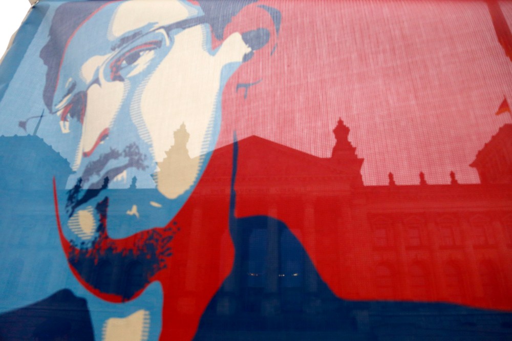 A flag depicting fugitive former U.S. National Security Agency contractor Edward Snowden, during a demonstration.