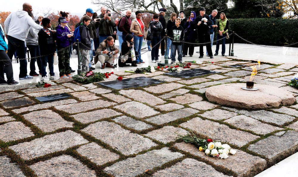 Visitors pay their respect at Arlington National Cemetery, Nov. 22, 2013.