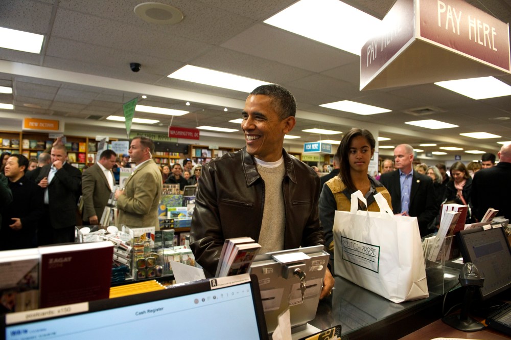 President Barack Obama shops with daughter Malia at Politics and Prose Bookstore and Coffeehouse in Washington, D.C. on Nov. 30, 2013.
