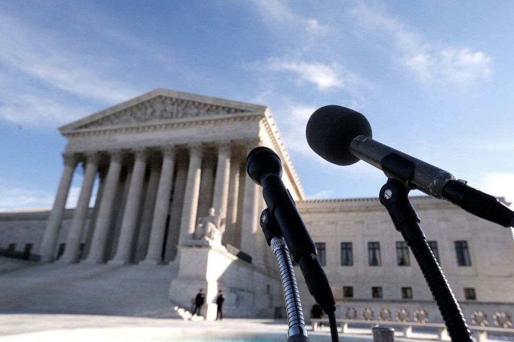 Microphones are set up in front of the U.S. Supreme Court in Washington on Jan. 13, 2014.