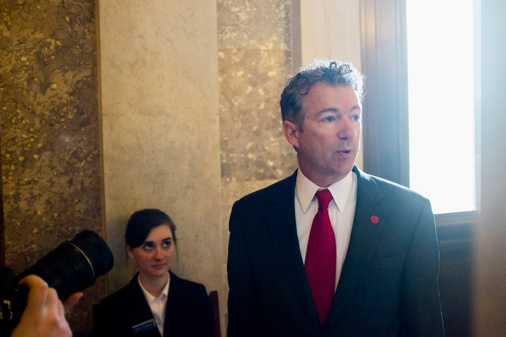 Senator Rand Paul arrives for the Republican weekly policy luncheon on Capitol Hill in Washington, jan. 28, 2014.