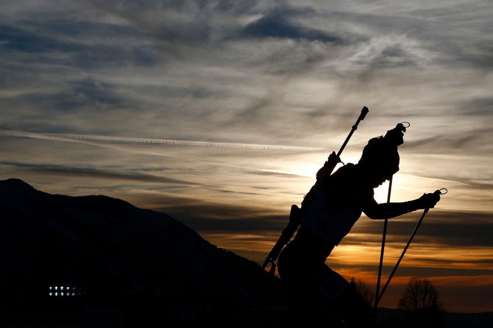 Norway's Tarjei Boe skis during the men's biathlon 20 km individual event at the Sochi 2014 Winter Olympic Games in Rosa Khutor Feb. 13, 2014.