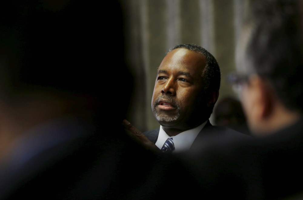 Republican presidential candidate Ben Carson talks to pastors and community leaders during a meeting at the Bilingual Church in Baltimore, Md., May 7, 2015. (Photo by Carlos Barria/Reuters)