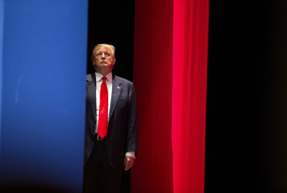 Real estate developer Donald Trump prepares to go on stage to speak during the Freedom Summit in Greenville, S.C., May 9, 2015. (Photo by Chris Keane/Reuters)